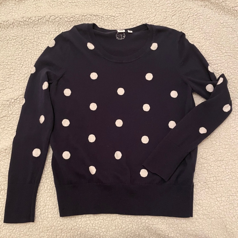Sweater. Fits loosely on an x-small.